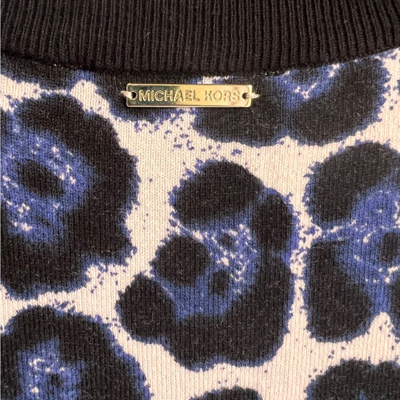 Micheal Kors form fitting, animal print dress. Stretchy material. Lightly worn - Picture 2 of 4